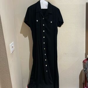 Women’s Black dress beautiful buttons and very long dress.